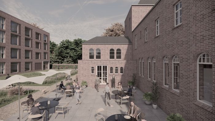 Impressie Transformatie Clarissenklooster – Hotel Clara Eindhoven, binnenhof met terras, baksteen en boogramen
