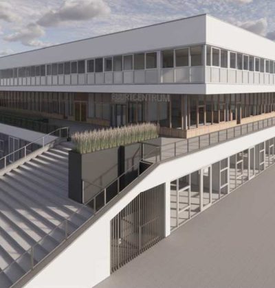 Bedrijfsgebouw met langgerekte glazen gevel, meerdere verdiepingen en verhoogd terras