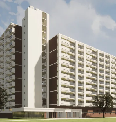 Appartementencomplex met hoge woontoren, gestapelde balkons en lage aanbouw aan groen grasveld